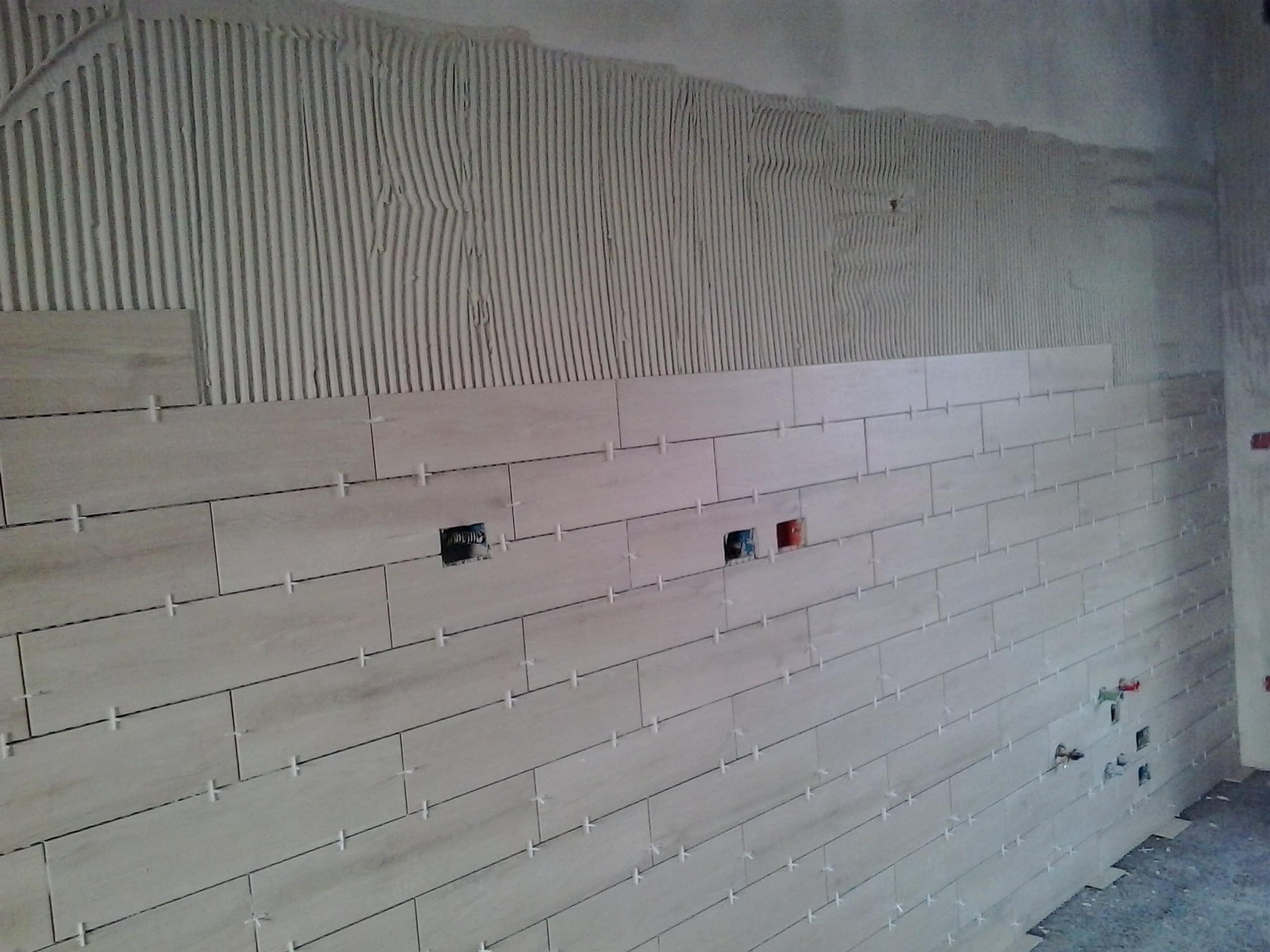 Posa piastrelle interni ed esterni