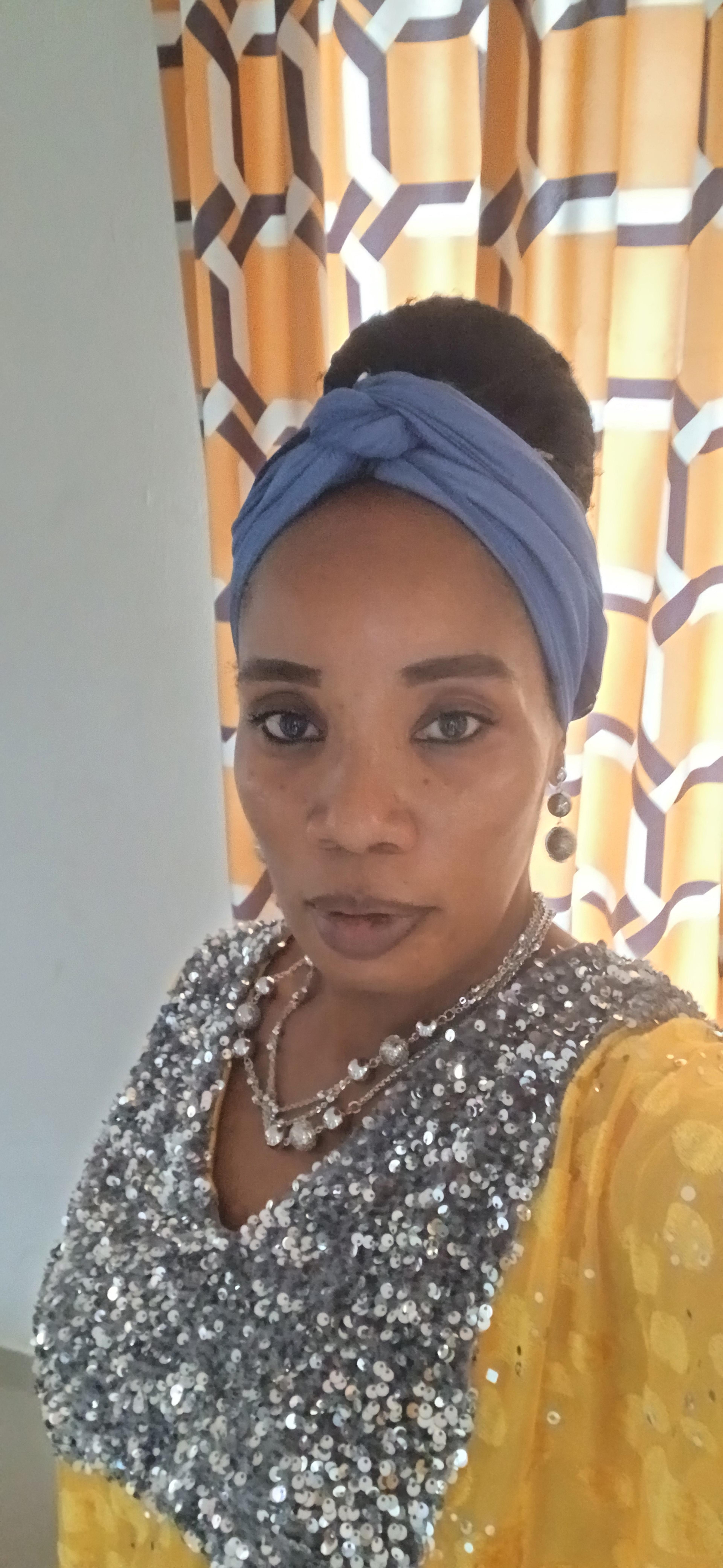 Margaret M OYENIYI