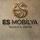 Es M. photo